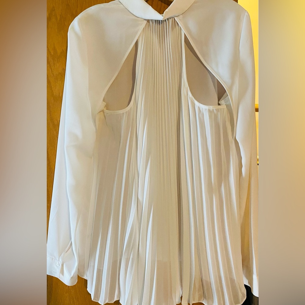 Never worn beautiful flowing top